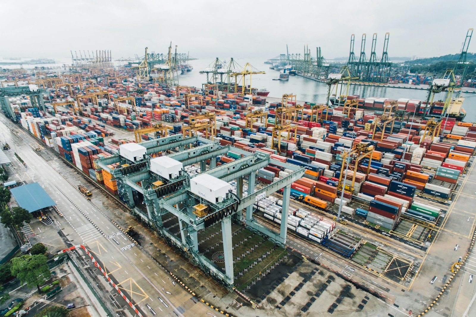 Aerial view of stacked shipping containers at a port